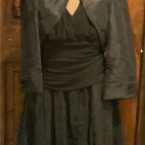 Very nice dress worn once. Removable jacket.  Made by S.L Fashions.